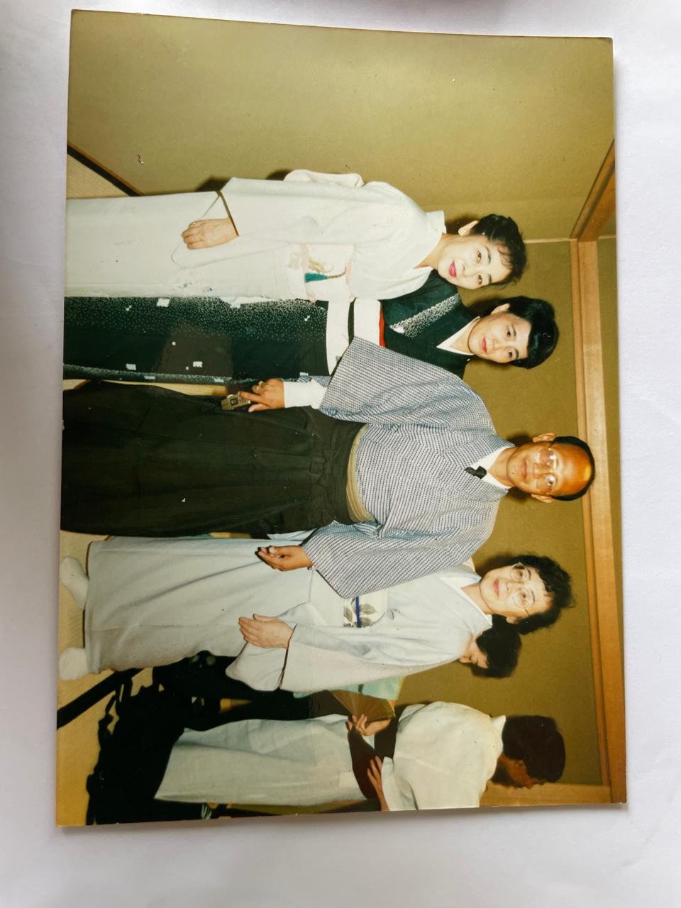 Iridescent ripples of a bright blue and pink liquid